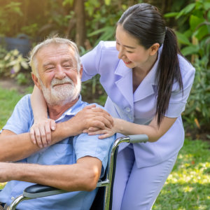 nurse and elderly smiling