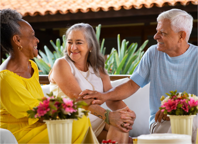 three people talking